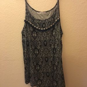 Navy blue fringe accent  patterned tank top.